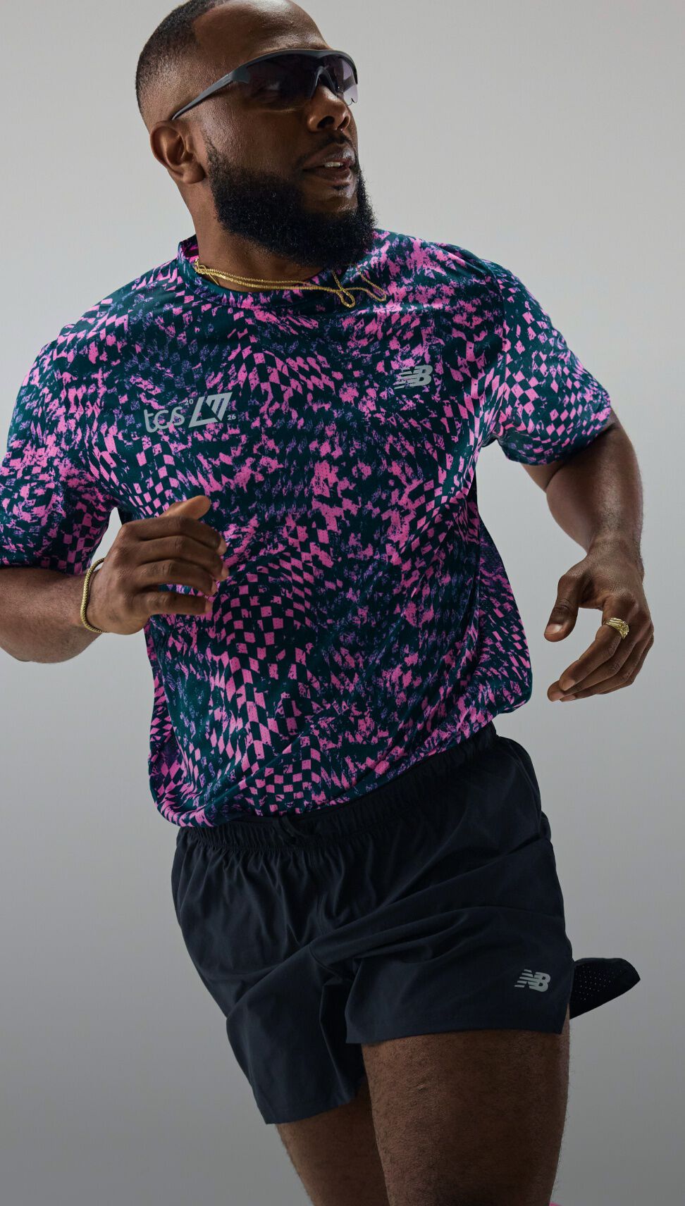 men running in an in-studio environment with london marathon race range apparel