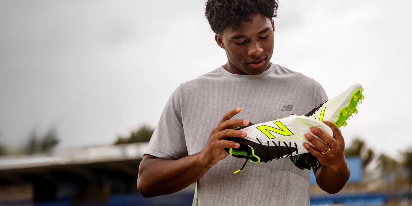 Endrick holding a pair of tekela